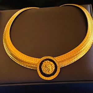 A Ladies Graduated Omega Necklace Slide Sold